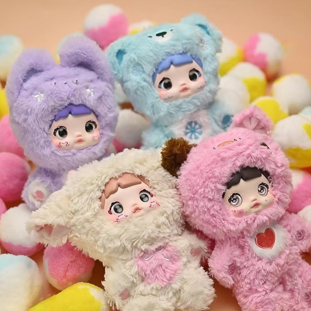 Nommi Plush Charm