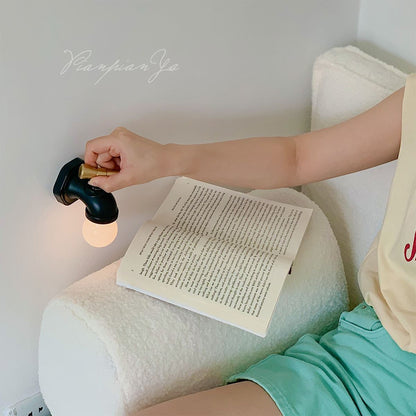 Tap-Style Wall Lamp