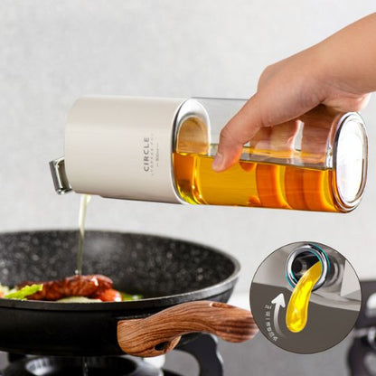 Oil Dispenser with Automatic Lid
